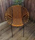 Chaise de jardin orange et noir motifs losange